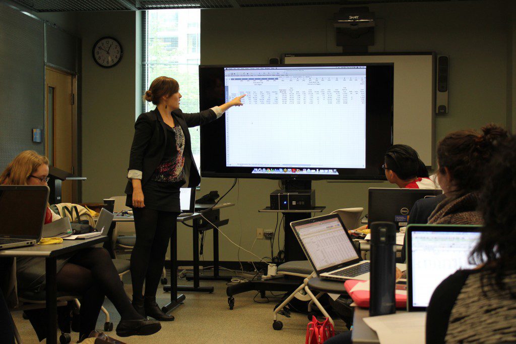 Neptis researcher and transportation engineer, Erin Toop, explains statistics during a Senior Reporting data journalism workshop at Ryerson University on Oct. 9. 